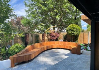 Corner seating, paving, hard landscaping