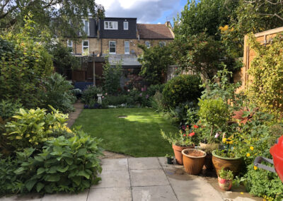 hard landscaping, paving, potted plants, lawn
