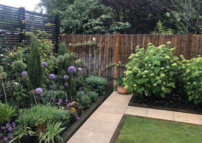 hard landscaping, pathways, paving, bedded plants, grass, lawns.